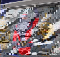 Mrs Claus and Santa - Schoolies Week Accommodation