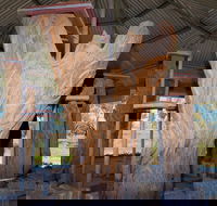 Collymongle Carved Trees - Schoolies Week Accommodation