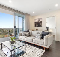 Brand New Apartment With Balcony Gym and Sauna - Schoolies Week Accommodation