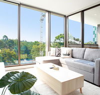 Designer Apartment with Balcony in Quiet Suburb - Schoolies Week Accommodation